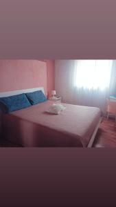 A bed or beds in a room at Il Podere di Massi