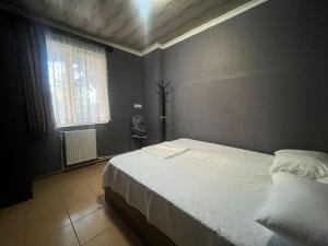 Postel nebo postele na pokoji v ubytování Nano Guest House