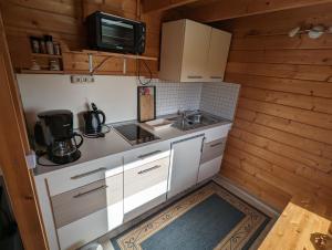 Kuchyň nebo kuchyňský kout v ubytování Ferienhaus 2