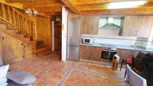 Kuchyň nebo kuchyňský kout v ubytování La Casina de Marina de Tresgrandas