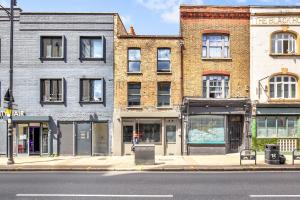 a group of buildings on a city street at Skyline Studios in London