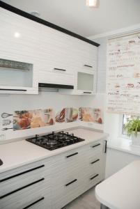 A kitchen or kitchenette at Bazar Apartment