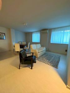 a living room with a couch and a table at Casetta in Andria