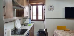 Kuchyň nebo kuchyňský kout v ubytování La Casina de Marina de Tresgrandas