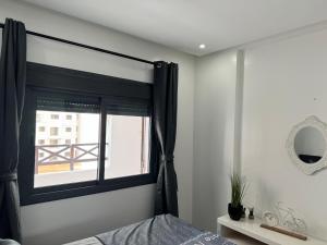 Postel nebo postele na pokoji v ubytování Maha Beach Cabo Negro Duplex 6 person
