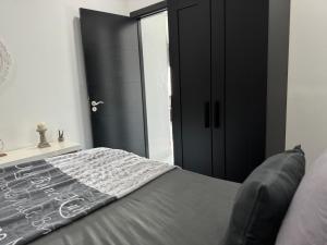 Postel nebo postele na pokoji v ubytování Maha Beach Cabo Negro Duplex 6 person
