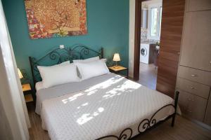Postel nebo postele na pokoji v ubytování Casa da Bugainvillea