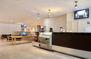 Kuchyň nebo kuchyňský kout v ubytování Hotel Plaza Génova Centro