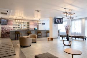 TV a/nebo společenská místnost v ubytování Hotel Plaza Génova Centro