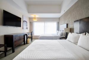 Postel nebo postele na pokoji v ubytování Hotel Plaza Génova Centro