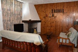 TV a/nebo společenská místnost v ubytování VILLA CARLA Affiliato Best-Incoming CIR-016235-CNI-00004