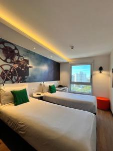 Katil atau katil-katil dalam bilik di ibis Styles Montevideo Biarritz