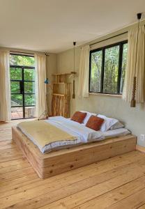 Ένα ή περισσότερα κρεβάτια σε δωμάτιο στο Karma Hostel