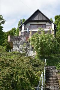 a house on top of a hill with stairs at Panoramahaus auf dem Gipfel des Bükk in Bükkszentkereszt