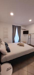 Postel nebo postele na pokoji v ubytování Stop al Duomo