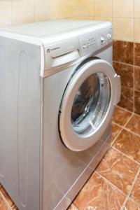a washer and dryer in a kitchen at Corfu Downtown in Corfu Town