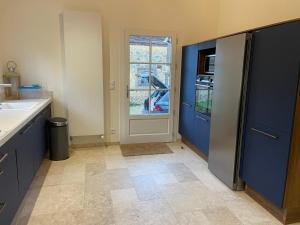 Kuchyň nebo kuchyňský kout v ubytování Charmante maison de campagne percheronne + 23 fotografií