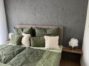 Postel nebo postele na pokoji v ubytování Ferienwohnung Dahoam