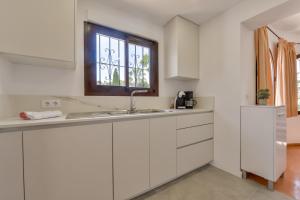 Küche/Küchenzeile in der Unterkunft Villas Guzman - Flores