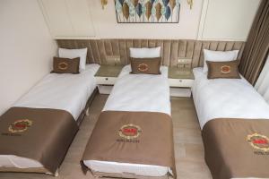 Postel nebo postele na pokoji v ubytování Safa Hotel Old City