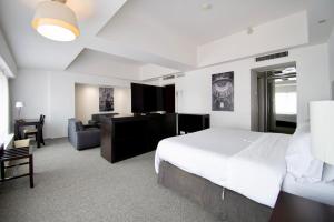 Postel nebo postele na pokoji v ubytování Hotel Plaza Génova Centro