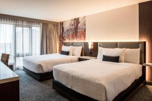 Ένα ή περισσότερα κρεβάτια σε δωμάτιο στο Hotel 43 Boise