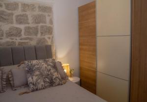 Posteľ alebo postele v izbe v ubytovaní Apartments Bubalova Split