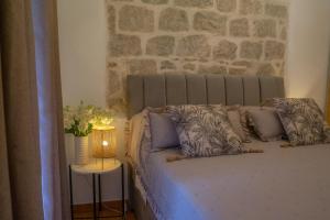 Posteľ alebo postele v izbe v ubytovaní Apartments Bubalova Split