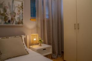 Posteľ alebo postele v izbe v ubytovaní Apartments Bubalova Split