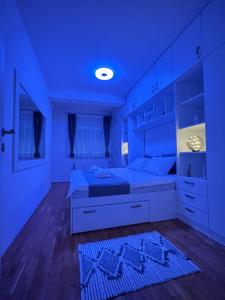 Postel nebo postele na pokoji v ubytování Bulevar Residence + 8 fotografií