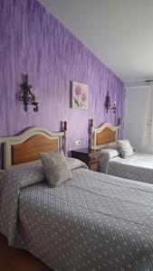Posteľ alebo postele v izbe v ubytovaní Casas Rurales Maribel - Complejo Alcalá del Júcar