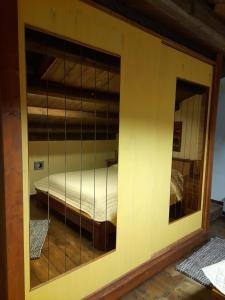 Ένα ή περισσότερα κρεβάτια σε δωμάτιο στο CASA ALESSIA MONOLOCALE +2 φωτογραφίες