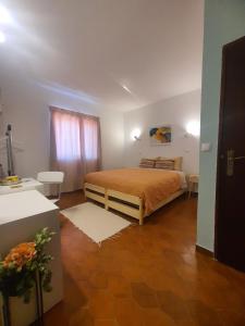 Кровать или кровати в номере Casa D'Olívia