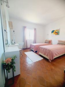 Кровать или кровати в номере Casa D'Olívia
