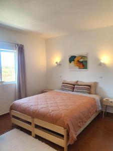 Кровать или кровати в номере Casa D'Olívia