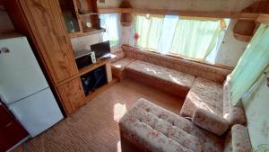an aerial view of a living room in a tiny house at Domek nad Stawami - Warmia in Jonkowo