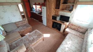an aerial view of a living room in a rv at Domek nad Stawami - Warmia in Jonkowo
