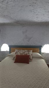 Posteľ alebo postele v izbe v ubytovaní Casas Rurales Maribel - Complejo Alcalá del Júcar