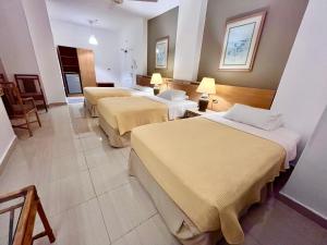 Postel nebo postele na pokoji v ubytování Masaya Hurghada