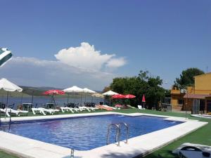 Der Swimmingpool an oder in der Nähe von Aparthotel Las Palomas