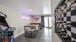 a dining room with a table and wine racks at Last Call Never in Ottawa