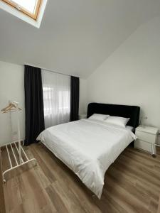 Postel nebo postele na pokoji v ubytování Apartment Magnolia gallery + 19 fotografií