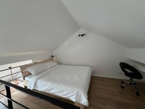 Postel nebo postele na pokoji v ubytování Apartment Magnolia gallery