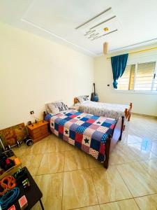 Postel nebo postele na pokoji v ubytování Appartement Saidia 1er étage 2 min de la plage a pied !