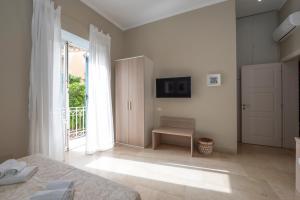 Μια τηλεόραση ή/και κέντρο ψυχαγωγίας στο Le Mura - Charme rooms +37 φωτογραφίες