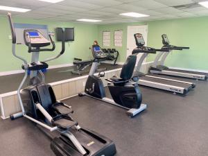a gym with several treadmills and cardio machines at Pet friendly tiny home, No extra fees! The Jitney in Clermont
