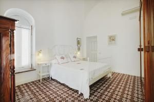 Postel nebo postele na pokoji v ubytování Suite Villa Carolina + 37 fotografií