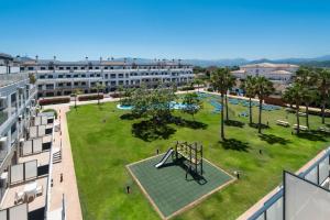 an aerial view of a park with a playground at MET Apto en Las Dunas, Oliva Nova in Oliva