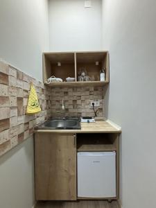 Kuchyň nebo kuchyňský kout v ubytování New Meidan