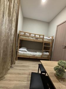 Postel nebo postele na pokoji v ubytování New Meidan